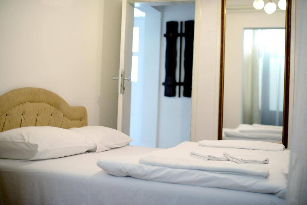 Guest room with fresh white linen